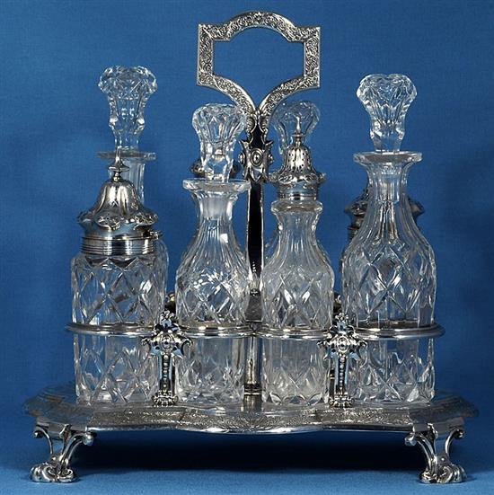 A Victorian silver eight bottle cruet stand and eight original bottles, by Walter & John Barnard, height 280mm, weight 40oz